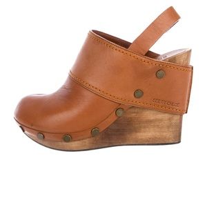 Brown platform See by Chloe clogs